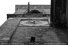 View of the bell tower of the Church of San Siro in a snowstorm Campanile Novaggio.jpg