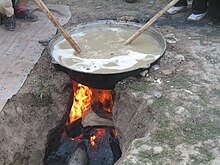 Sumalak being made in a kazan in a ground oven. Sumalak being made in a Kazan.jpg