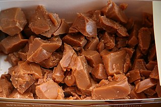 <span class="mw-page-title-main">Toffee</span> Confection made by caramelizing sugar or molasses along with butter and flour