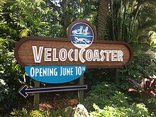 Sign for the VelociCoaster, displaying the June 10 opening date Velocicoaster June 10.jpg