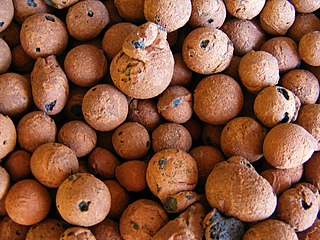 Expanded clay aggregate Lightweight aggregate made by heating clay at high temperature in a rotary kiln