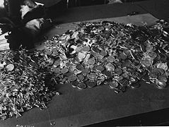 Medals and St. George crosses donated by soldiers for the needs of the revolution.jpg