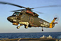 SH-2F Seasprite landing on USS Nicholson, 1 August 1983