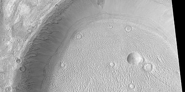 Ring-mold craters, as seen by HiRISE under HiWish program