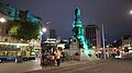 Deliveroo and Just Eat food delivery riders waiting at the monument for jobs to appear in the locality, June 2024