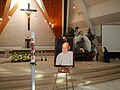 Funerary portrait of Reuter beside the Paschal candle