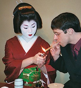 Geisha and client, by Todd Laracuenta