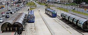 Green Line (Linha Verde) biarticulated express buses (ligeirão) at Marechal Floriano Station (Linha 550)