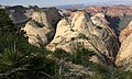 Inclined Temple (left) and Ivins Mountain seen from West Rim Trail