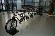 A large tandem, or more specifically, a quint (for five people) OpelFahrrad.JPG