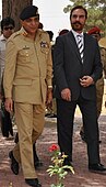 General Kayani wearing the standard Sherwani-based ceremonial uniform of the Pakistan Army