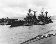 Tennessee (left) after the attack; West Virginia is next to her Pearlharbour bb48 bb43.jpg