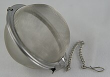 A mesh tea infuser ball Tea ball.jpg