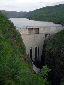 A subplot in which a dam is built on tribal land by King Runeard alludes to Norway's controversial Virdnejavr Dam. Altakraftverket, Norge.jpg