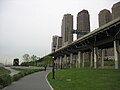 Looking north in Riverside Park South. The Trump Place and West Side Highway is on the right and the New York Central 69th Street ferry is on the left.