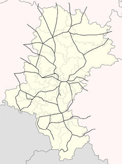 Mapa konturowa województwa śląskiego, w centrum znajduje się punkt z opisem „Tychy”