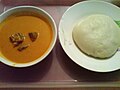 Plate of fufu (right) accompany by peanut soup