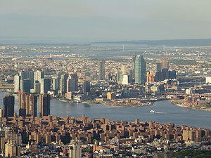 The expanding skyline of Long Island City in Queens with One Court Square as seen from across the East River opposite Stuyvesant Town–Peter Cooper Village in 2017