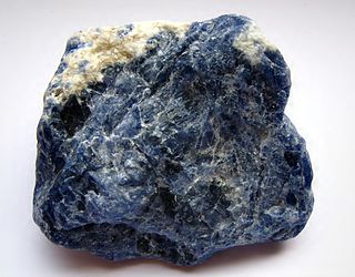 <span class="mw-page-title-main">Sodalite</span> Blue tectosilicate mineral