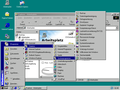 Der Explorer in Windows 98; im Vordergrund das aufgeklappte Startmenü mit der Taskleiste (unten), dahinter der Dateiverwalter mit dem Spezialordner Arbeitsplatz (im Hauptfenster) und im Hintergrund der Desktop