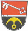 Gemeinde Herrnsdorf Durch einen quer durchgehenden silbernen Pilgerstab geteilt von Rot und Schwarz; oben ein schräg liegender silberner Schlüssel, unten eine goldene Wolfsangel.[35]