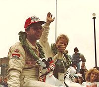 Hertz (left), with Hannu Mikkola after winning the 1982 Scottish Rally Hertz mikkola2.jpg