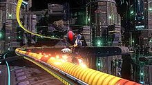 An image depicting Shadow the Hedgehog grinding on a rail in Space Colony ARK, the first stage. SXSG Screenshot.jpeg