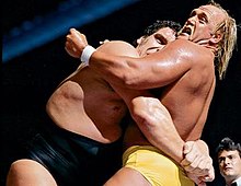 Andre the Giant applying a bear hug to Hulk Hogan in their WWF World Heavyweight Championship match. Hogan and Andre.jpg