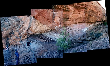 A horse sits between the walls of this normal fault located near Upheaval Dome, Utah. The fault plane traces from the upper right to the lower left of the image. The horse is the broad lens-shaped feature in the rock defined by the splitting and rejoining of the trace of the fault plane. Geologic horse.jpg