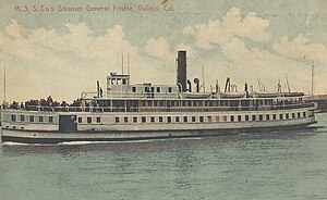 A faded photograph showing a steamboat at sail with passengers on the foredeck and four lifeboats visible. Text reads "M. S. S. Co's Steamer General Frisbie, Vallejo, Cal."