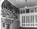 The lobby/entrance to the theatre with photos of actors who appeared at the theatre. c. 1930–1940.