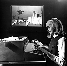 Girl sitting at a teleprinter with an image of a Mesopotamian city behind her.