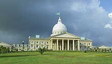 The Palau flag flies over the Capitol of Palau. Capitol-complex-melekeok-palau20071220.jpg