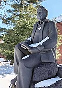 Statue of poet Robert Frost, sculpted by Penelope Jencks, and installed at Amherst College in Amherst, Massachusetts.