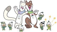 A cartoon illustration of two anthropomorphic stoats wearing scarves with their arms around each other's shoulders. On the left is a white stoat and on the right is a brown stoat with a missing leg. Surrounding the stoats are six small fairy-like characters with green costumes and white flowers on their heads.