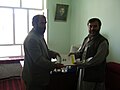 Dean of Agriculture faculty (left) receives books of Soil Science in 2009