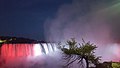 A view of Horseshoe Falls with the Canadian flag at night