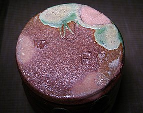 Example of Newcomb College Pottery marks from Meyer vase. This vase has no registration number, but dates from 1895-1907 due to the "FR" marking.