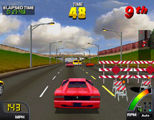 Arcade version screenshot featuring the Itali P69 (Ferrari 512 TR) in a race in Chicago, Illinois, USA. ARC Cruis'n USA.png