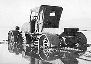 Experimental marsh buggy, 1928, stuck in mud.