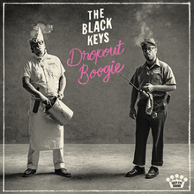 A black-and-white photo of the band dressed as a chef and a janitor. The band's name is colored in white and the album title is written in pink cursive text.