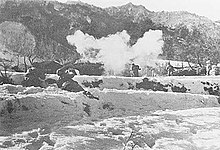 Soldiers charging into thick smoke