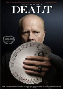 DVD cover showing Turner holding a fanned group of cards in front of him