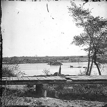 1865 picture of Wreckage of CSS Jamestown in the James River. (Photograph by Mathew Brady) WreckofCSSJamestown.jpg