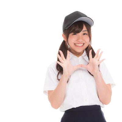 勝利に喜ぶ野球部の女子マネの写真