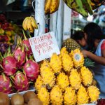 Vibrant produce on display at the Surquillo Market in Lima, Peru