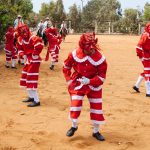 Performers doing the Dance of the Devils' at Hacienda Mamacona