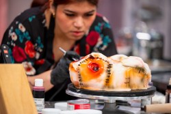 Contestant Megan Aucone, baking process, as seen on Halloween Baking Championship, Season 10.