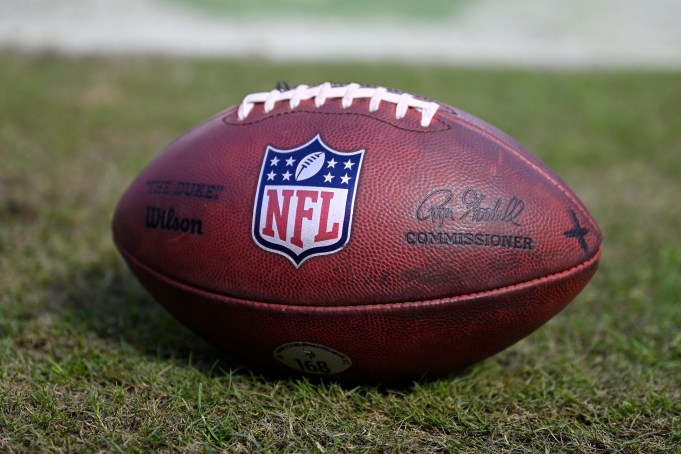 CHICAGO, ILLINOIS - OCTOBER 15: A detailed view of the NFL logo on a football prior to the game between the Minnesota Vikings and the Chicago Bears at Soldier Field on October 15, 2023 in Chicago, Illinois. (Photo by Quinn Harris/Getty Images)