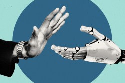 A human hand turning down a handshake from a robot hand